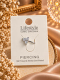 Silberfarbener Nasenring Piercing mit drei Zirkonia-Steinen