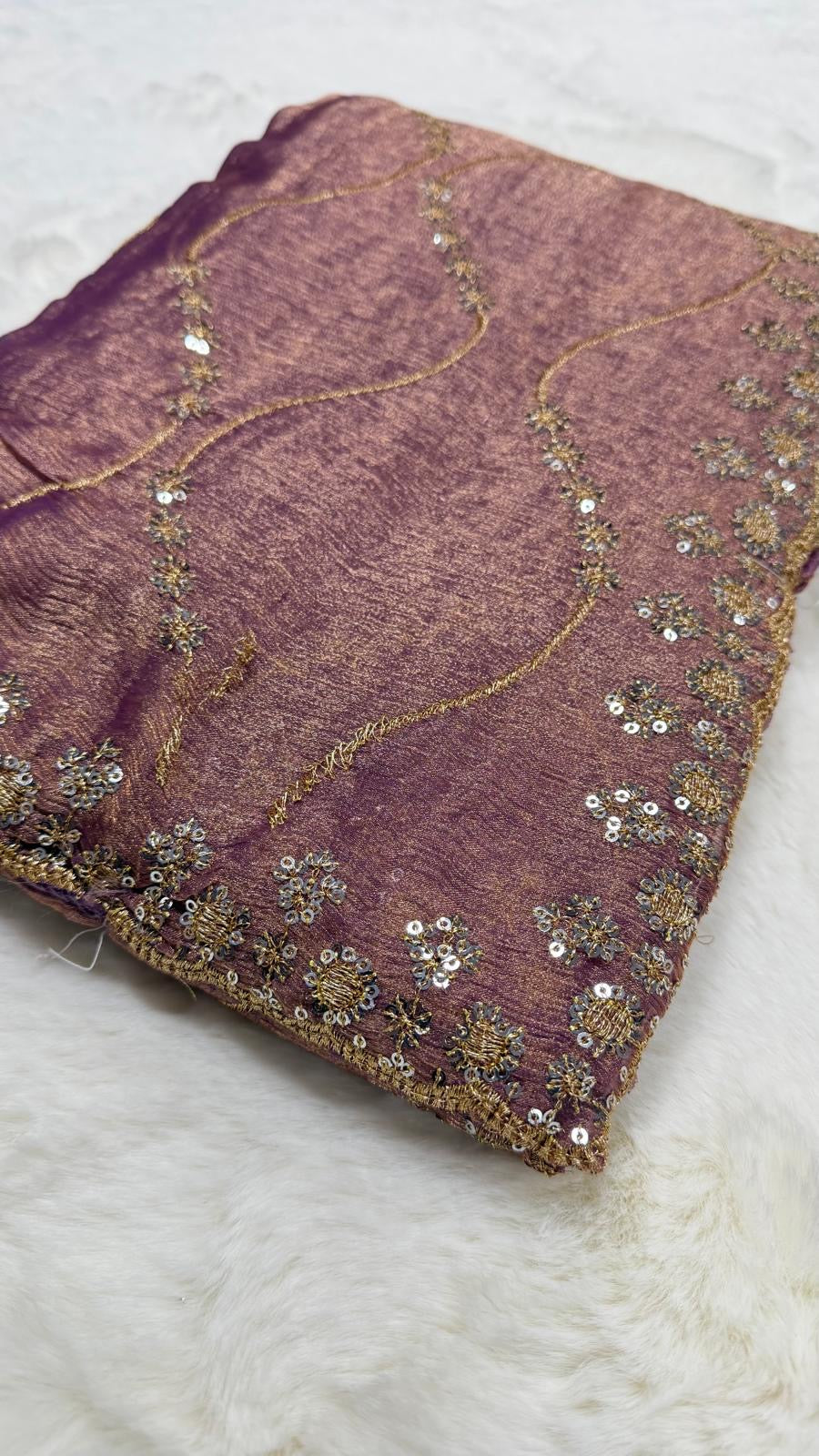 Mauve tissue saree pallu with gold embellishment detail