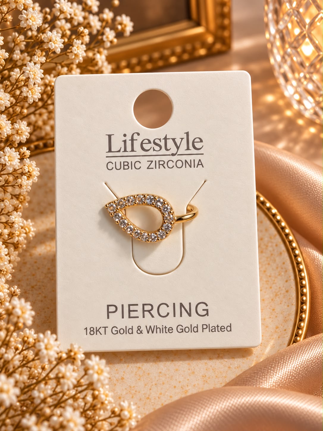 Nasenring Piercing in Tropfenform mit Zirkonia-Steinen, vergoldet