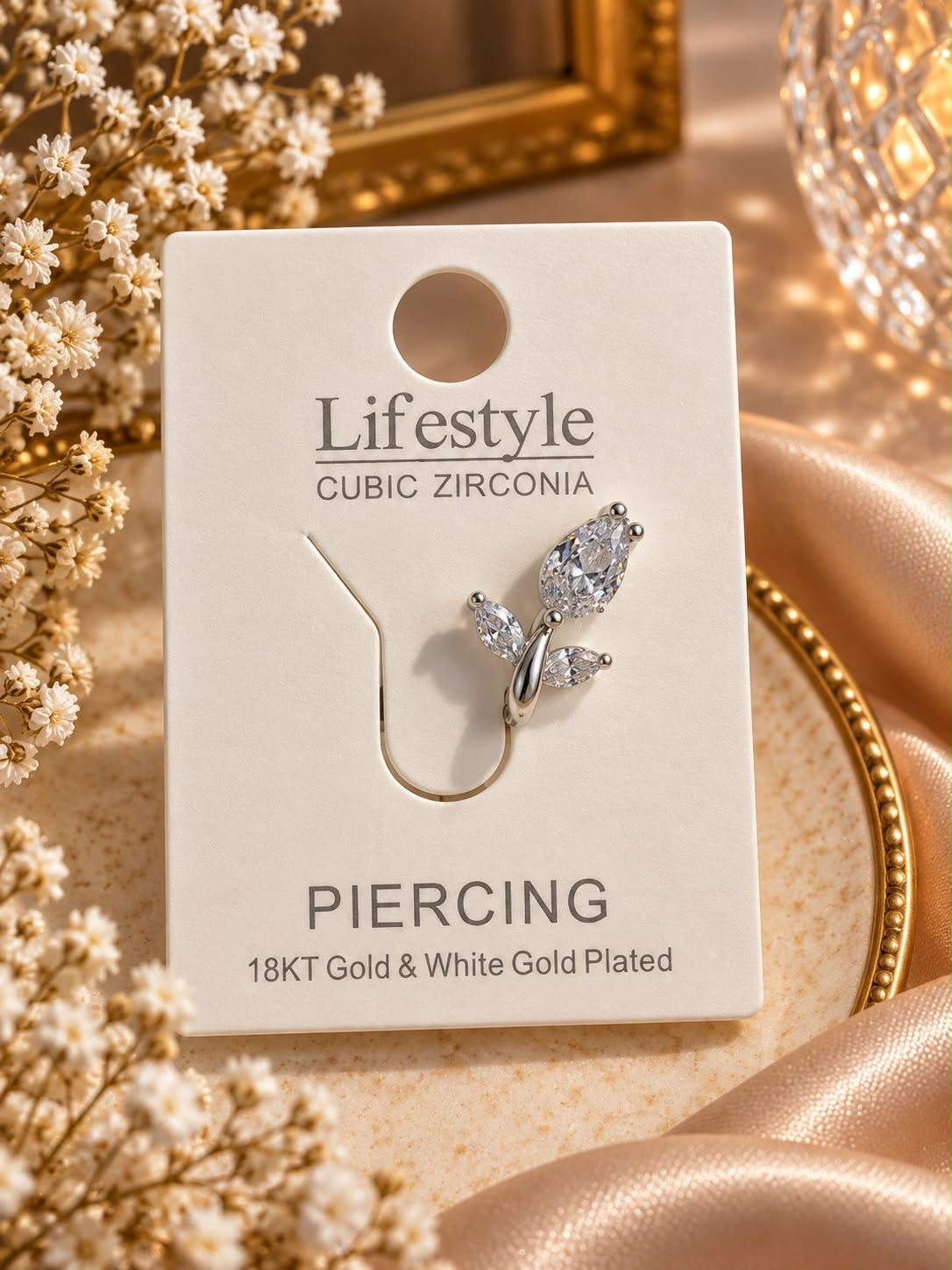 Silberfarbener Nasenring Piercing mit Blattmotiv aus Zirkonia-Steinen