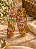 Gold bangles with Stones