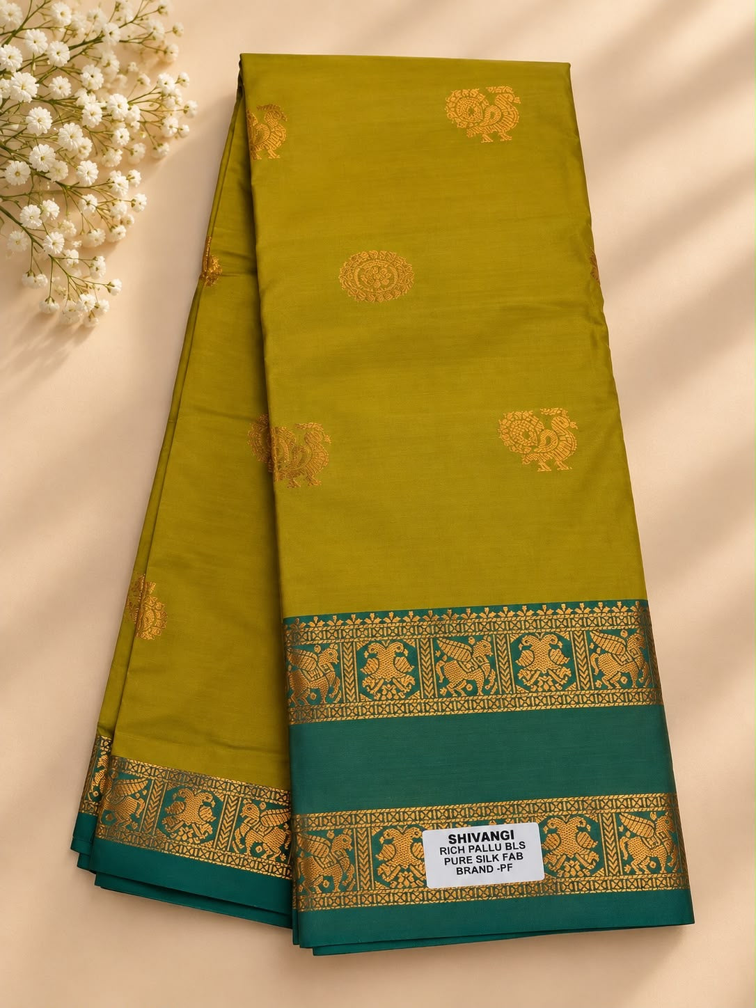 Traditional Saree with Gold-Tone Motifs and Contrast Border